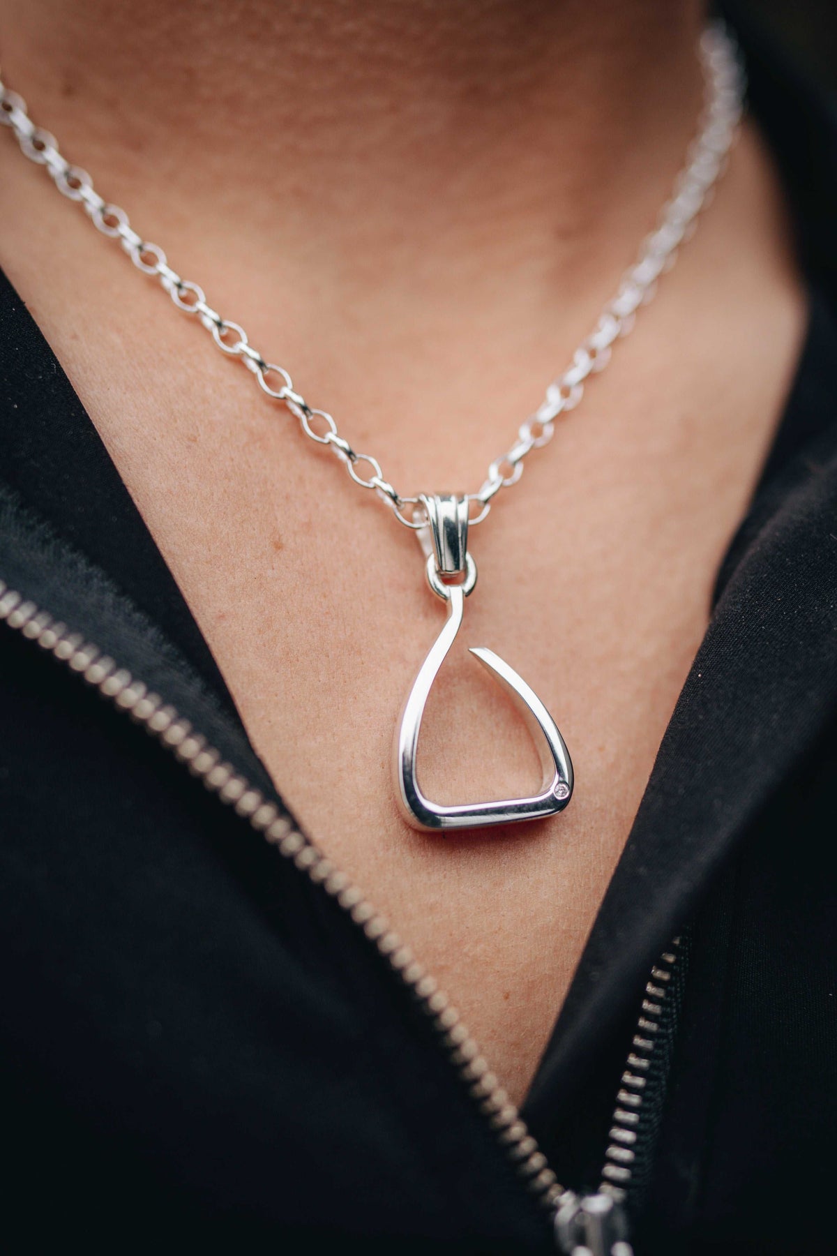 handcrafted equestrian necklace New Zealand. Worn by an equestrian horse rider.
