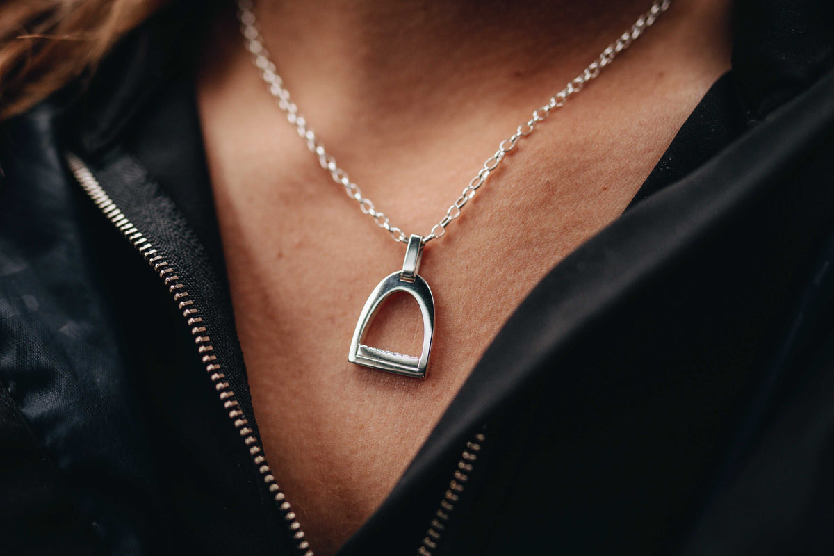 Sterling silver medium belcher chain close-up - equestrian jewellery handcrafted in New Zealand. Worn by an equestrian horse rider.