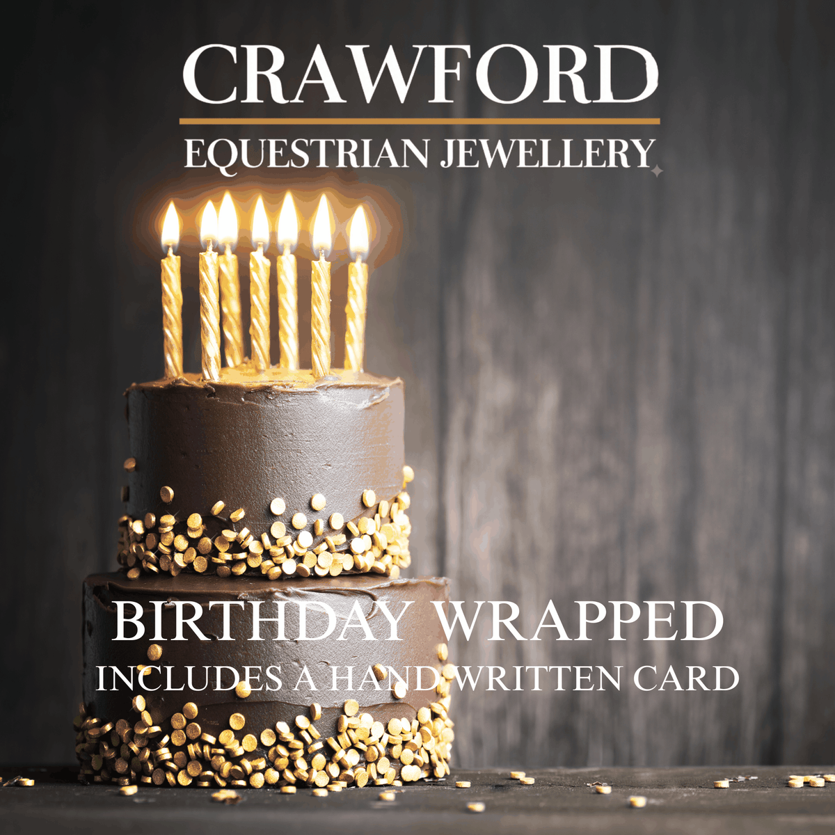 Birthday Gift Wrapping shown as a two-tier grey cake with gold sprinkles, lit candles and a handwritten card.