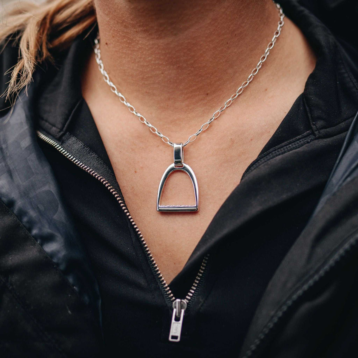 Horse Stirrup Jewellery pendant in polished silver, featuring a bold classic stirrup shape on a fine chain.