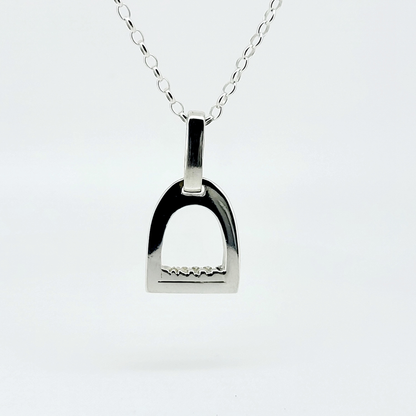 Product photo of small silver stirrup necklace. Made to be worn by horse riders by Crawford Hill Equestrian Jewellery.